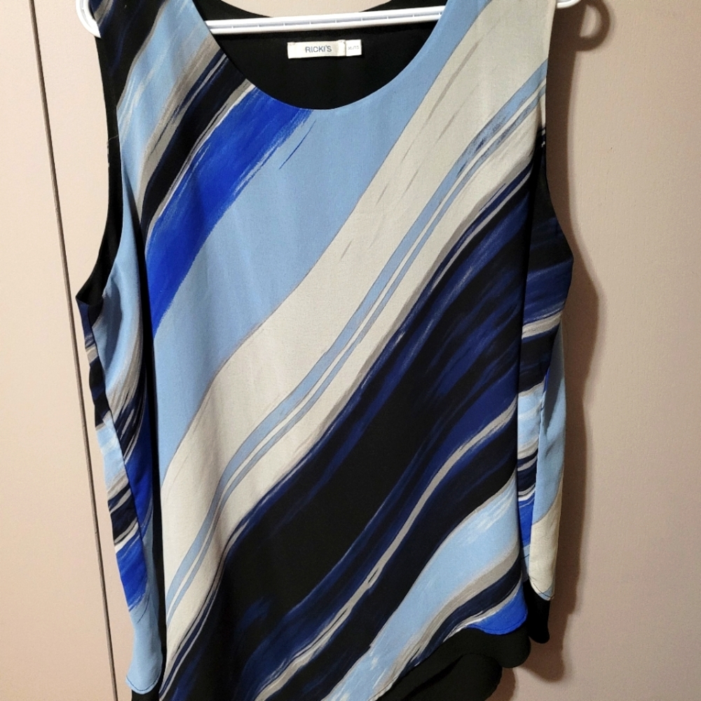 Asymmetric hem top